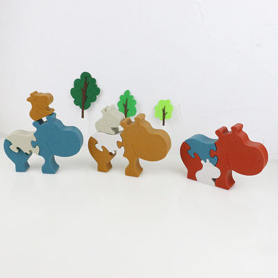 Silicone e brinquedos animais estando de madeira da criança do enigma do hipopótamo do enigma de serra de vaivém para o jogo da criança