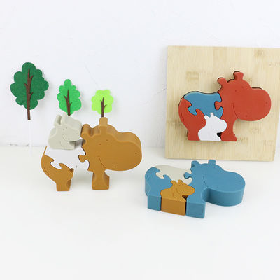 Silicone e brinquedos animais estando de madeira da criança do enigma do hipopótamo do enigma de serra de vaivém para o jogo da criança