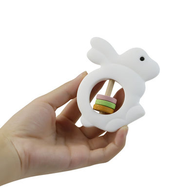 Os brinquedos amigáveis do bebê do silicone de Eco chocalham a forma do coelho para a criança