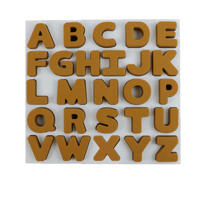 Enigma do silicone das crianças do produto comestível com forma do alfabeto das letras