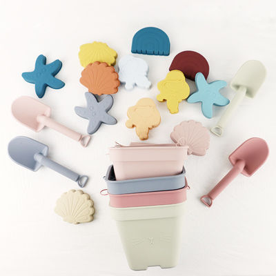 Os brinquedos unisex do silicone do bebê, cubeta da praia do silicone ajustaram-se com personalizam o logotipo
