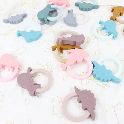 Bebê colorido Teether do silicone com forma animal do pinguim dos desenhos animados