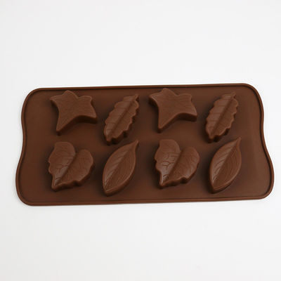 Os doces de chocolate personalizaram moldes do silicone para o cozimento do Natal