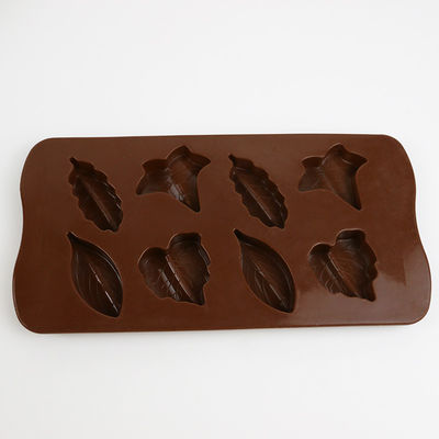 Os doces de chocolate personalizaram moldes do silicone para o cozimento do Natal