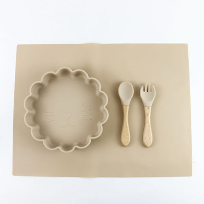O grupo dos utensílios de mesa do silicone do produto comestível, sução do silicone dividiu a placa impermeável