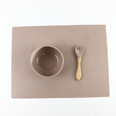O grupo dos utensílios de mesa do silicone do produto comestível, sução do silicone dividiu a placa impermeável