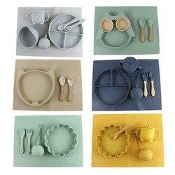 O grupo dos utensílios de mesa do silicone do produto comestível, sução do silicone dividiu a placa impermeável