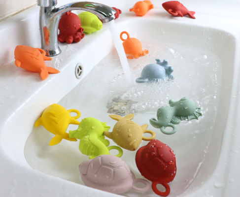 O silicone de borracha do bebê das cores brilhantes brinca BPA livre para a flutuação da água do bebê