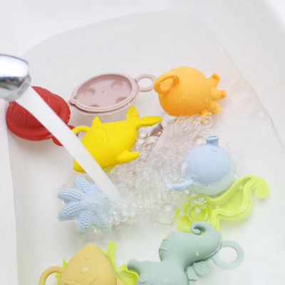 Crianças NOVAS das crianças da chegada que flutuam o produto comestível livre do bpa dos brinquedos do silicone do banho que sai os dentes brinquedos da água do silicone