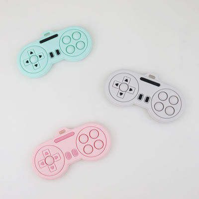 Bebê que sai os dentes produtos - brinquedos bonitos feitos sob encomenda dos teethers do silicone da forma do controlador do jogador dos desenhos animados das várias cores laváveis