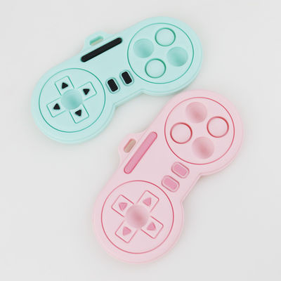Bebê que sai os dentes produtos - brinquedos bonitos feitos sob encomenda dos teethers do silicone da forma do controlador do jogador dos desenhos animados das várias cores laváveis
