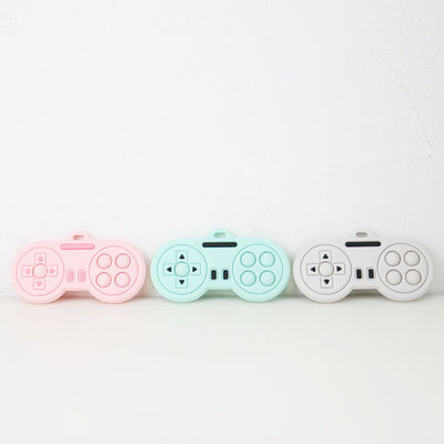 Bebê que sai os dentes produtos - brinquedos bonitos feitos sob encomenda dos teethers do silicone da forma do controlador do jogador dos desenhos animados das várias cores laváveis