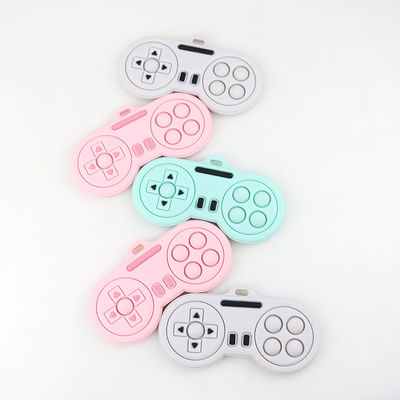 Bebê que sai os dentes produtos - brinquedos bonitos feitos sob encomenda dos teethers do silicone da forma do controlador do jogador dos desenhos animados das várias cores laváveis