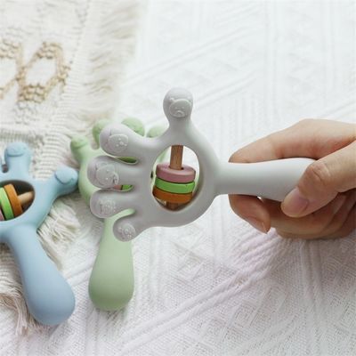 Soft Baby Silicone Teething Rattle Brinquedos em forma de mão de palma: sem BPA, não tóxico, mastigável