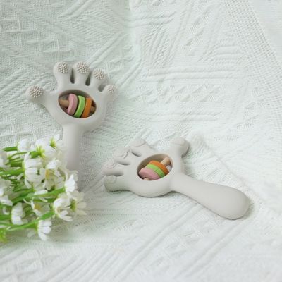 ODM Bebê Brinquedos de silicone Grupo etário Bebês Crianças Crianças Rattle Forma de mão
