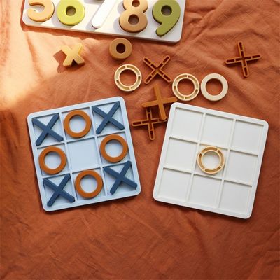 MOQ 50 Sets Silicone XO Tic Tac Toe Puzzle Logotipo personalizável Cores BPA Gratuito Certificado CE Brinquedos de silicone